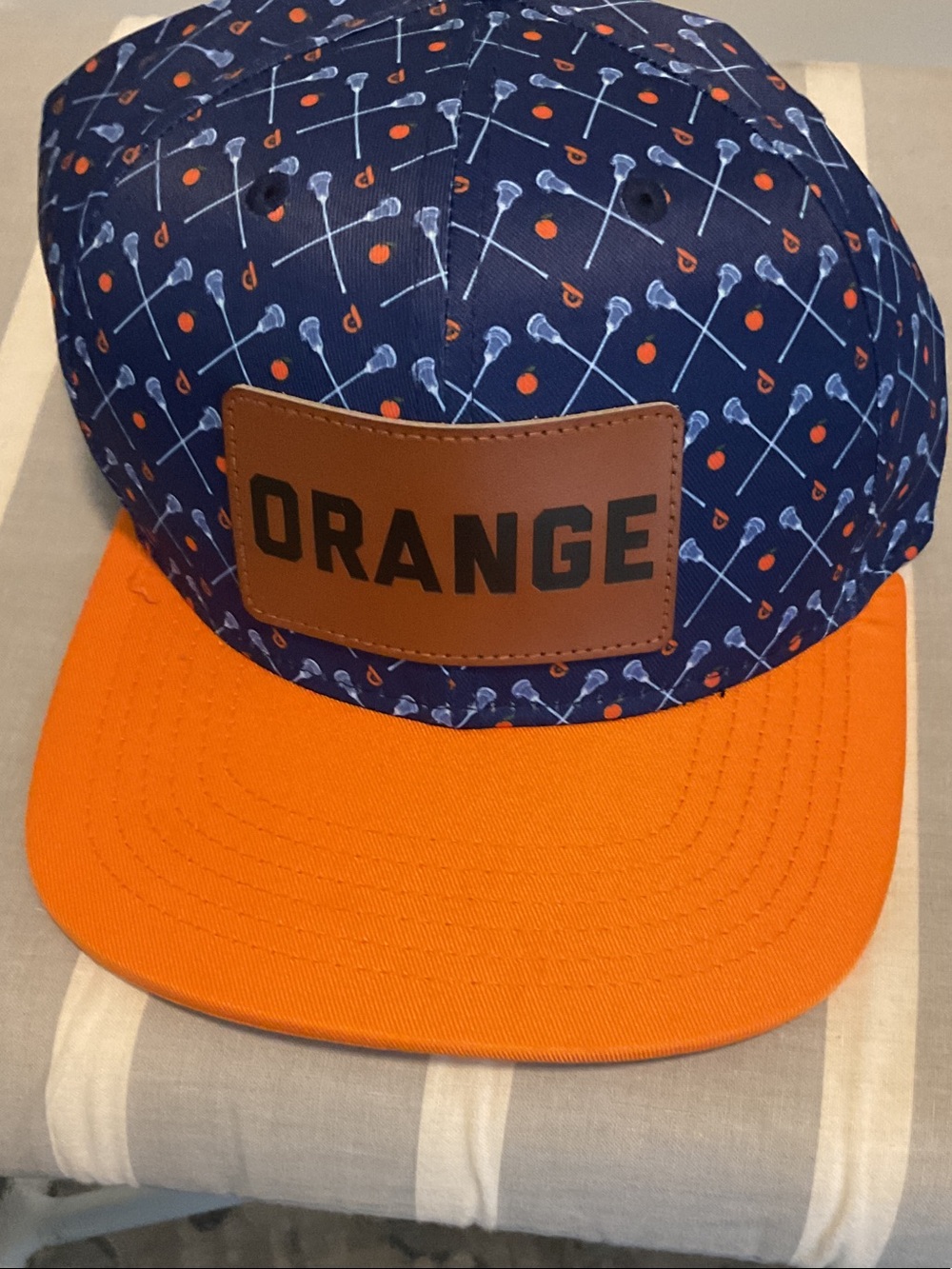 Orage Navy Lacrosse-Print Kids Cap with Bright Orange Brim